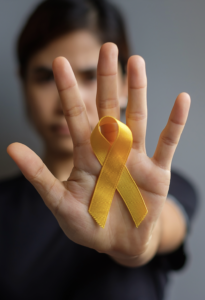 suicide prevention day sarcoma bone bladder childhood cancer awareness month yellow ribbon supporting people living illness children healthcare world cancer day concept